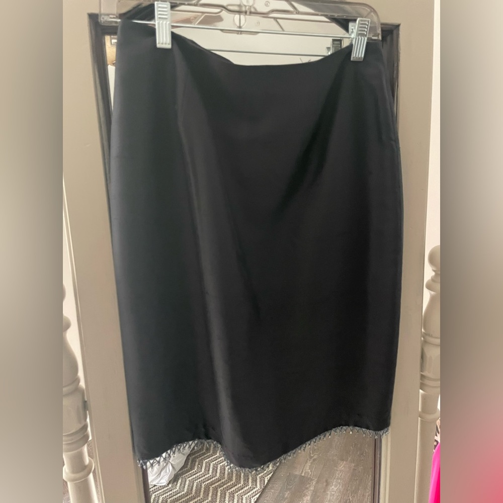 100% black raw silk skirt beaded accent trim on bottom like new only worn 1 time